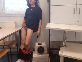 Risky Jon Arteen, a hot twink, wanks in class, aiming for his seat. He shoots his load, hoping his teacher doesn't catch him. A thrilling, public wank session in a classroom.