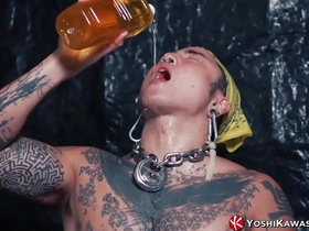 Yoshi Kawasaki, a tattooed Asian jock, indulges in a hardcore fetish by drinking his own pee after a hot session. This solo video showcases his big cock and Asian charm.