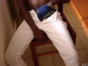 Kalem, a sizzling black African twink, flaunts his massive package. He's all about self-pleasure, stroking his shaft to a heated climax, culminating in a glorious ejaculation.