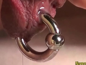 Inked Asian lad, alone in the shower, indulges in self-pleasure. His expert hands work magic on his throbbing member, aiming for a glorious cumshot. This solo gay performance is a feast for the senses.