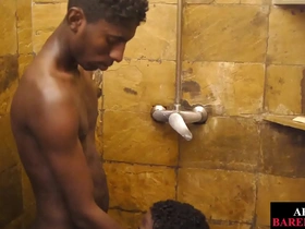 A slender African lad washes his suds in the shower when a pal's dong gets a BJ. They switch to doggy for a raw, intense pounding, culminating in a hot, messy finish.