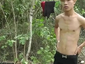 Asian teen boys shed their clothes and indulge in sensual gay sex, exploring bondage and handjobs outdoors. Their slender bodies, Asian descent, and youthful energy create a captivating spectacle of gay pleasure.