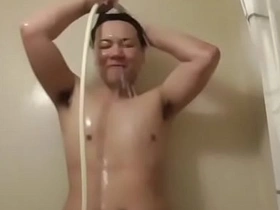 Famous Japanese gay boy, Simoyaka, in a steamy shower scene. His chiseled body glistens under hot water, his intimate areas exposed for all to see. A must-watch for fans and newcomers alike.