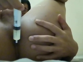 A young Chinese boy indulges in a solo session, leaving his tight ass filled with hot cum. His moans echo as he's pumped to the brim, creating a tantalizing spectacle.