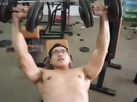 Get ready to pump up your love handles and enjoy a tit workout that'll leave you feeling like a fat fucker. This Vietnamese gay gym video is a must-see for fans of chubby guys getting down and dirty.