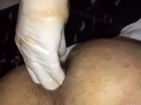 Experience the ultimate in anal pleasure with our bot fisting master. Watch as he expertly stretches a Vietnamese boy's ass with his massive cock. Get ready for some intense fist action!
