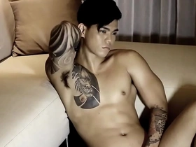 Hong Hai, Vietnam's hottest gay model, captivates in his latest photoshoot, leaving fans wondering - who is this mysterious, sensual man? Uncover the allure of his raw, sexual energy in this sizzling video.
