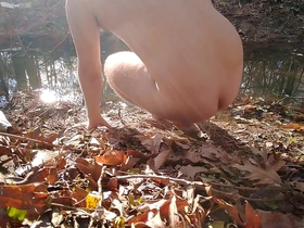 Boy goes for nude dip in the creek