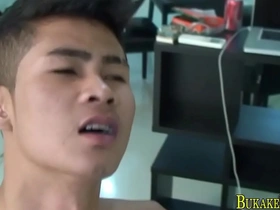 A steamy shower session turns into a wild bareback romp. The young, skinny Asian twink gets his tight hole filled with hot cum. The scene ends with a messy facial cumshot.